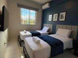Quarto com Ar Condicionado e banheiro no centro