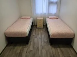 Twin room in Shared Apartment