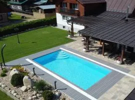Chalet Schäfer s vyhřívaným bazénem se slanou vodou a saunou