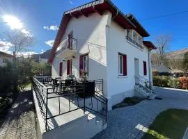 Homestay bedroom, shared kitchen and living room