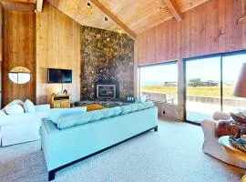 Ocean view home with stone fireplace dog-friendly