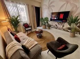 The Monstera Sanctuary - Tropical 3BHK in a Gated Society