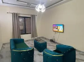 Oriline Business 106 - Grand Appartement Moderne avec Clim WiFi Gardien pour 4 Personnes Max - Mougali