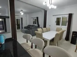 Royal Green Haven 3BR Apartment near Airport Obour