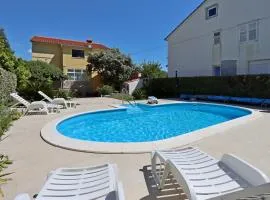 Family-friendly apartments with swimming pool Banjol, Rab - 5007