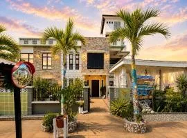 REEF HOUSE BACNOTAN beige sand beach front with Swimming pool