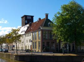 Het Dakhuis – hotel w pobliżu miejsca Dworzec kolejowy Harlingen w mieście Harlingen