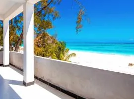 Ocean-View Balcony - Uroa 2 bedroom Beachfront apt