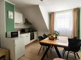 Ferienwohnung Am Kirchplatz Klimatisierte Dachgeschosswohnung