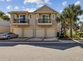Beautifully designed townhouse nestled in the wooded charm of Amelia Island