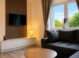 Ferienhaus mit Parkplatz, Sauna, Innenhof und WLAN