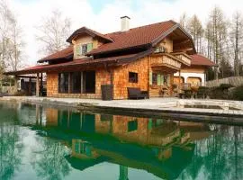 Luxury Chalet with Swimming Pond Nature Escape Upper Austria