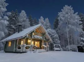 Log cabin on the riverbank