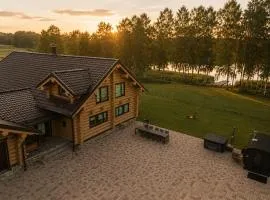 Private lakeside holiday house with fireplace, sauna, hot tub - Ezernams Dzintars
