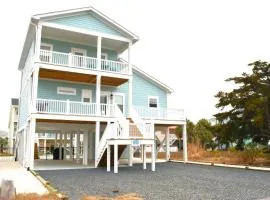 Coastal Chaos 303 Sand Piper Ln, home