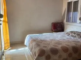 Apartment 7 min to the beach and 10 min airport ibn battouta
