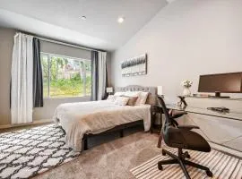 King-size bed master room with crib