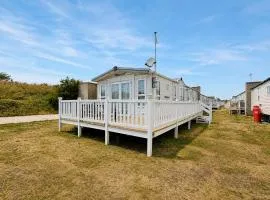 Lovely Caravan With Large Decking At Naze Marine Holiday Park Ref 17306Br