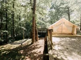 Woodland Safari Tent with Fire Pit & Hammocks in Dawsonville, Georgia