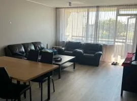 Cozy 2BR Apartment with Balcony and Parking
