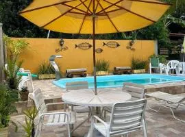 Casa em Condomínio com Piscina - Churrasqueira - 5 minutos da Praia