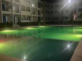 Appartement avec piscine en bord de mer