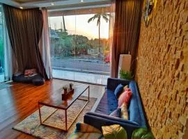 Boho sunset glass house nandi hills