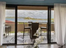 Spacious 2BR Retreat • Balcony Views + Parking