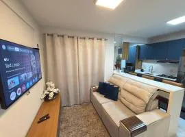 Apartamento novo, sendo dois quartos com ar, garagem coberta e internet