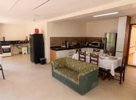 Casa em Itaúna 3 Quartos para 8 Pessoas com área gourmet a 150 m da Praia Ar Condicionado