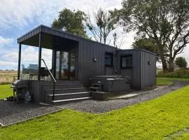 Luxury Glamping Cabin sleeping 4 People with Private Hot Tub and BBQ with views across the North Coast Ballycastle Pod 2
