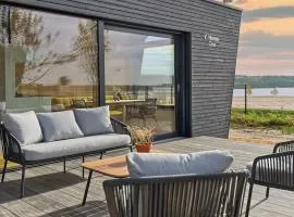 FUTOPIA Strandhäuser mit Seeblick, Sauna & Hot Tub