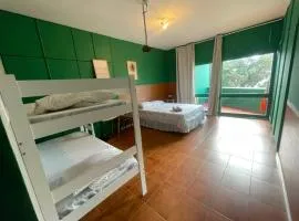 Cama em Suíte com varanda privada a 160 mts da Praia 4