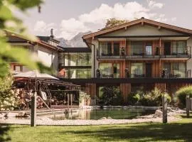 Wellness und Brunch Hotel MorgenZeit beheizter Naturteich Genuss Frühstück bis 13 Uhr Hochkönig Sommercard