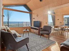 FUTOPIA Strandhäuser mit Seeblick, Sauna & Hot Tub