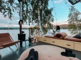 Specatular glass-igloo by the water!