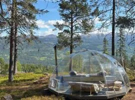 Glass-igloo with spectacular views of majestic mountains