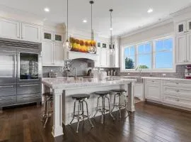 Lake-view luxury awaits at Serenity North 4 in Bay Harbor, MI, with 4 bedrooms.