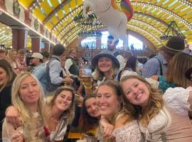 Beer Base-Camp Oktoberfest camping with free welcome beer and traditional dirndl-lederhosen shop