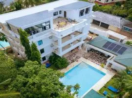 8-Suite Diani Villa with Private Kitchens, Pool, Gazebo, Pergola & 600m from the beach