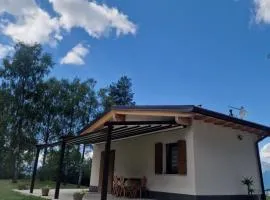 Baita Cornigol ai piedi delle Dolomiti