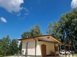 Baita Cornigol ai piedi delle Dolomiti