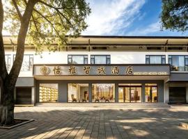 Paradise Hotel - 800m to Forest Park East Gate,next to the Bus Stn & English Butler&Self-service laundry facility, hotel en Zhangjiajie