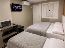 Loft Lux 4 Centro (Smart TV, ar-condicionado e cozinha completa)