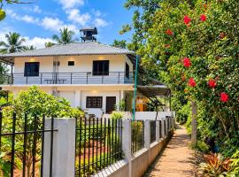 Green Lounge, hotel en Munnar