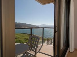 Apartamentos Tur&iacute;sticos Playa de Osmo