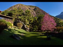 Pousada Paraíso Açú โรงแรมใกล้ Pedra do Sino ในอิไตปาวา