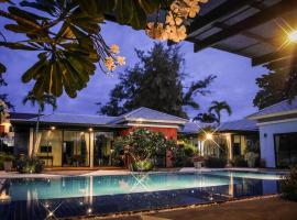 Villa Navin, hotel romântico em Praia de Jomtien