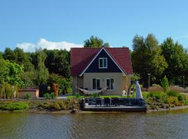 Well-kept house with a bubble bath, 20 km from Assen, kotedžas mieste Veassterbork