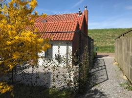 Heerlijk Dijkhuisje in Paal, hotell sihtkohas Graauw huviväärsuse Rilland-Bath Station lähedal